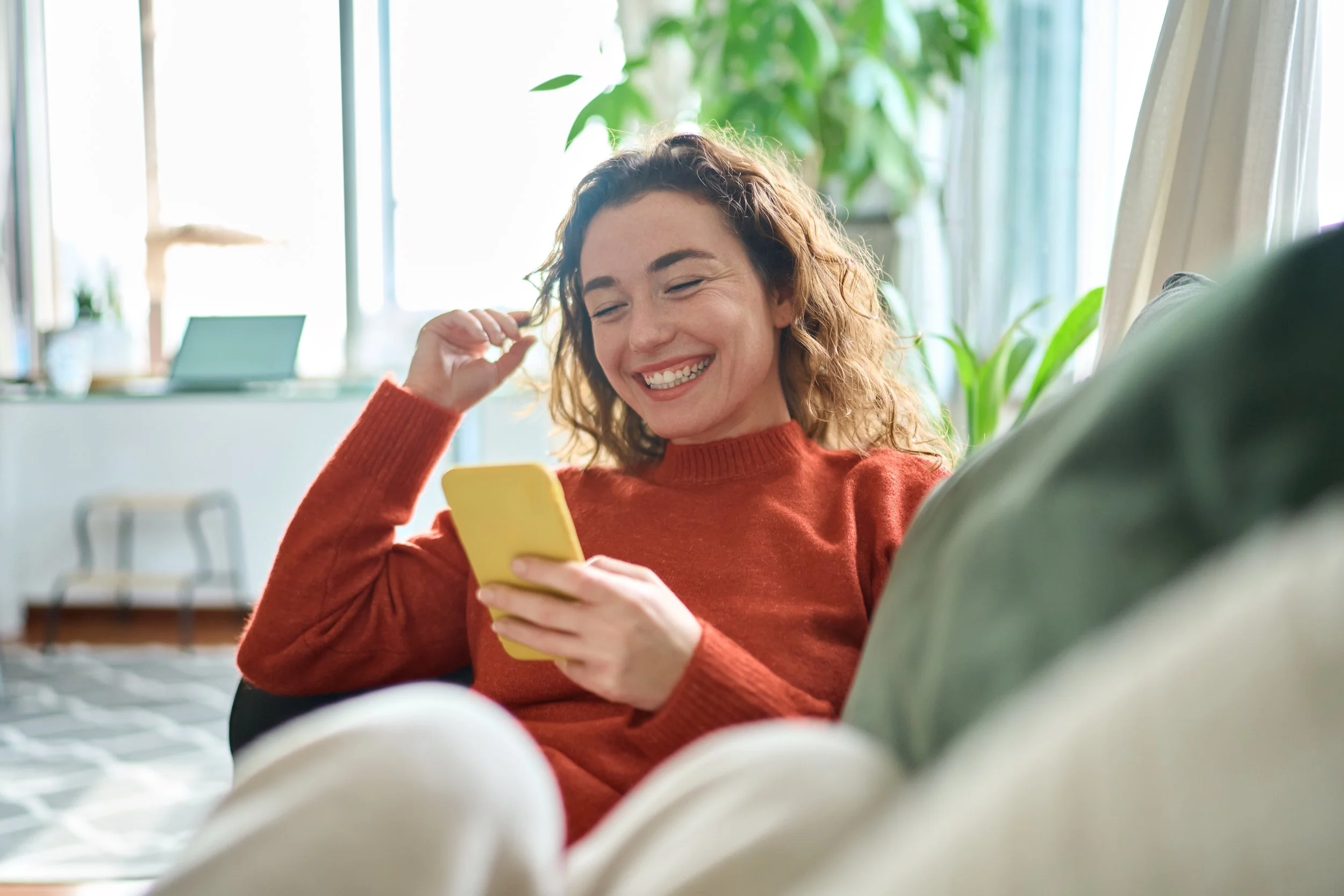 Woman smiling using providence AI estate agency
